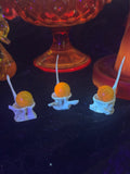 Uv reactive marbles with fish vertebrae stands